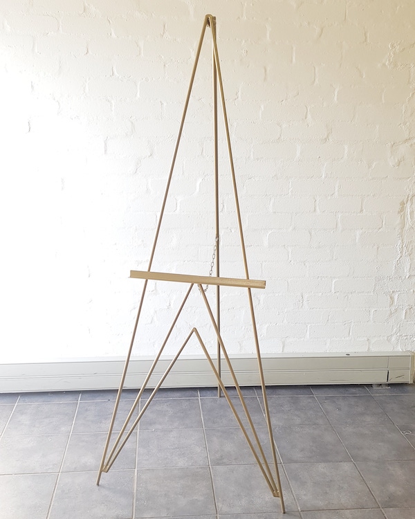 Modernist Easel Gold - <p style='text-align: center;'>R 200</p>